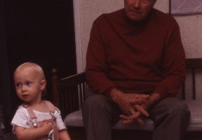 Johanna playing with the shoes of great-uncle Eero in Kampinkylä, Kurikka