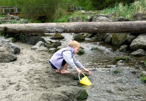 Tuomas getting some water from a nearby stream.