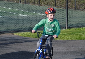 Tuomas riding his bike at the park