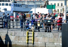 Amy, Elsa and Antti waiting for the ferry