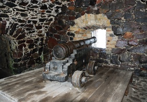 An old cannon inside the bunker.