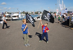 Tuomas and Antti with their pirate flags at the boat show