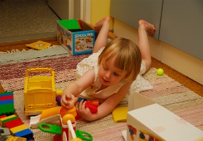 Elsa playing with the school bus