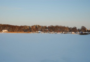 A marina in Herttoniemi. Note all the boats lifted from water and covererd with all sorts of tarps.