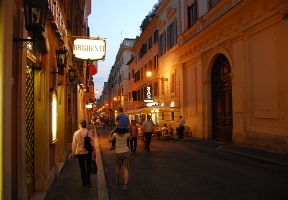 Johanna carrying Antti on her shoulders after dinner.