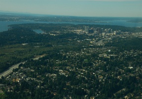Returning to Renton: Woodridge is in the foreground, downtown Bellevue behind it. The 520 floating bridge is visible in the top-left.