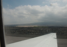 Taking off from Kona: the runway is in the middle of a lava field