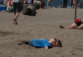 Tuomas resting in the sun and the sand